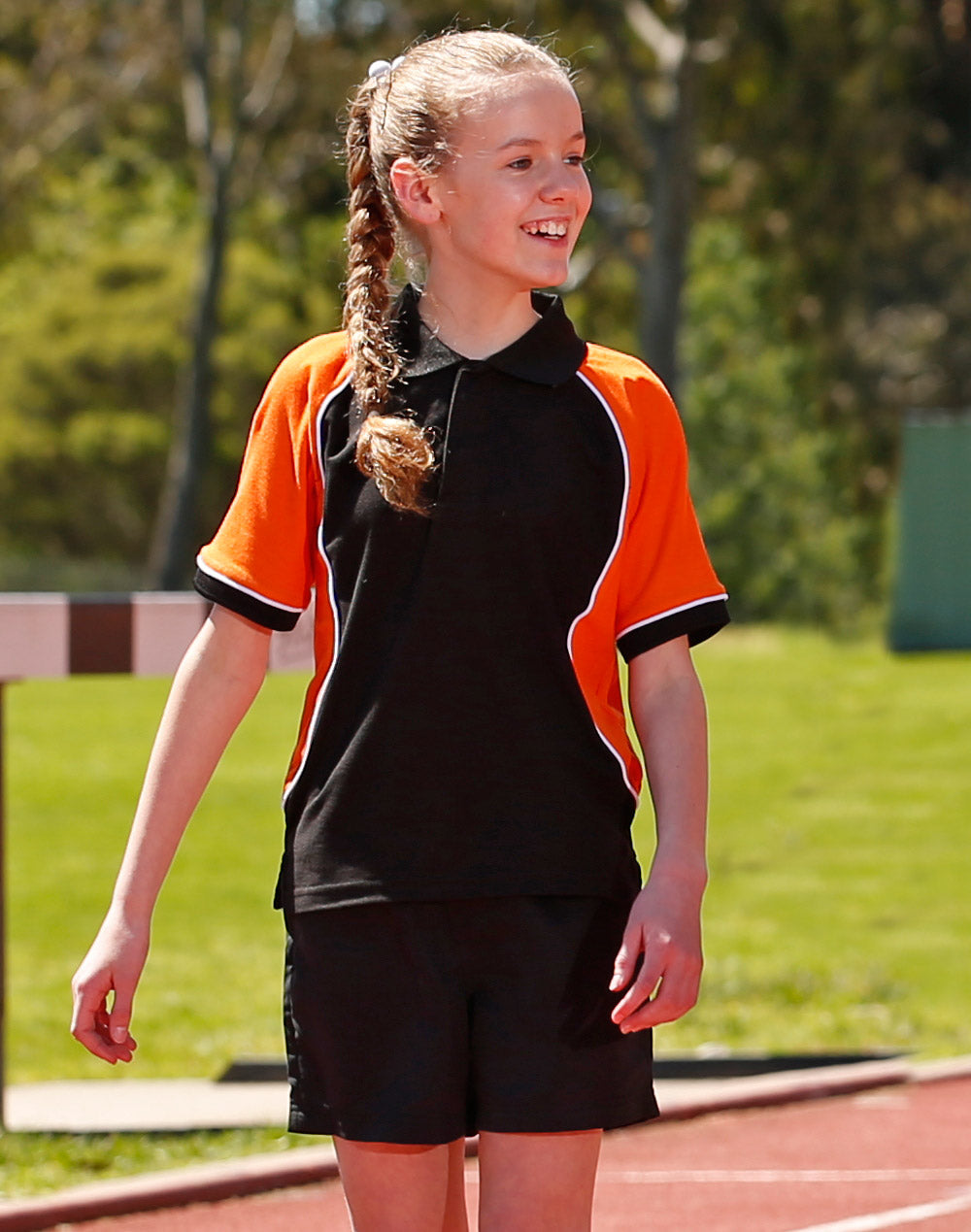 Arena Polo Kids - Black/White/Orange - Model